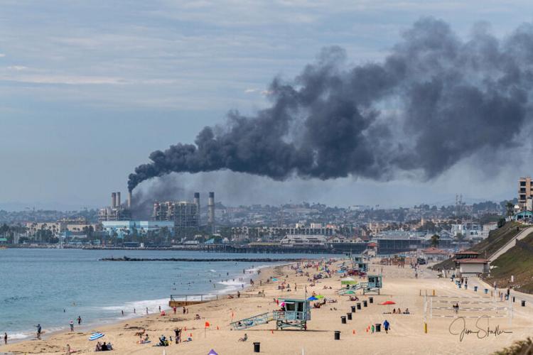Black smoke can be seen coming from the AES Redondo Beach power plant about 3 p.m. Thursday, July 25. (Courtesy Jim Stadler via Facebook)